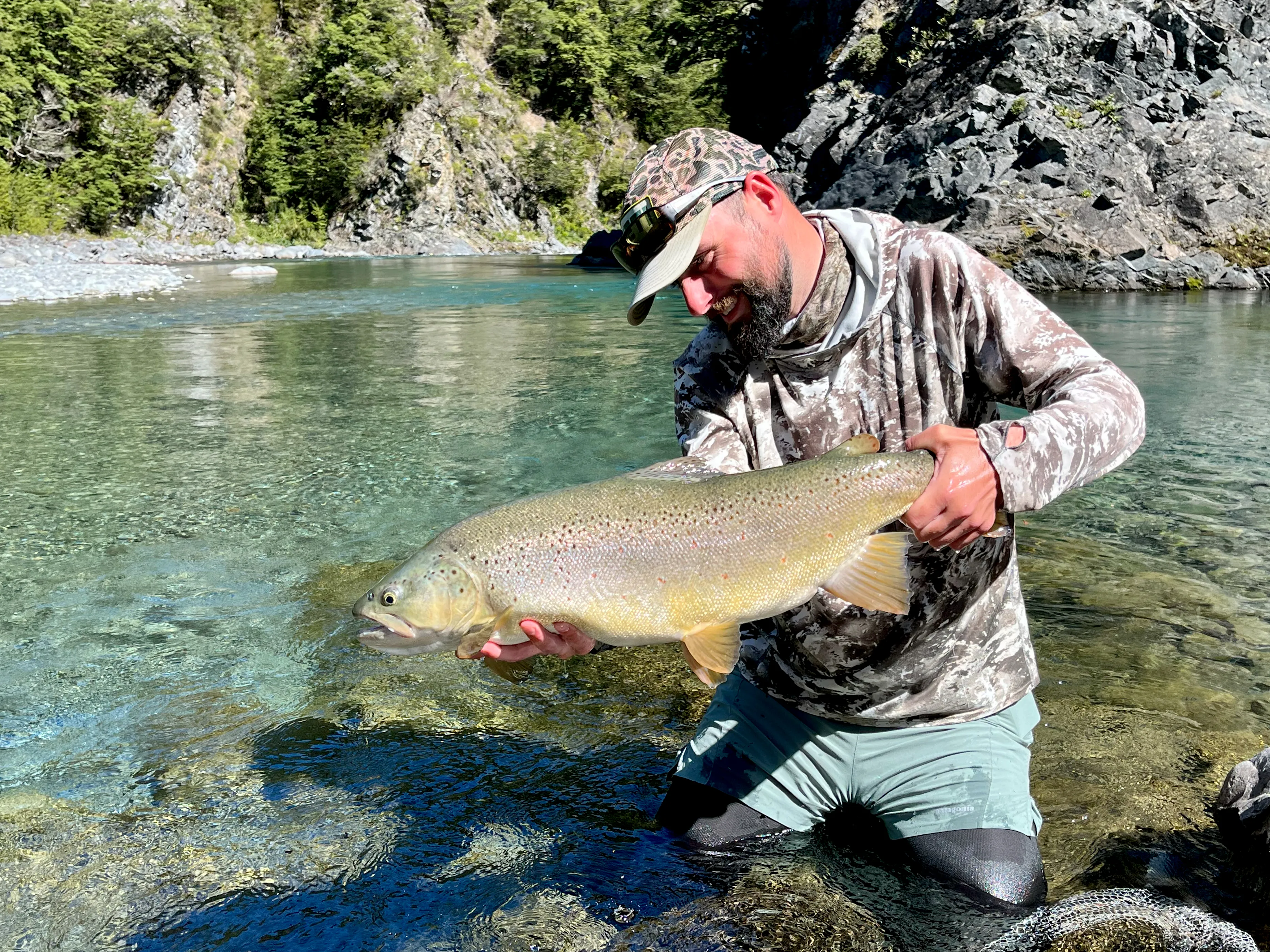 A massive 13 pound brown trout for the author. The fish showed classical mouse trout behavior and was finally enticed after having repeatedly cast to it for what felt like over 15 minutes. (Photo: Kresten Ovesen)