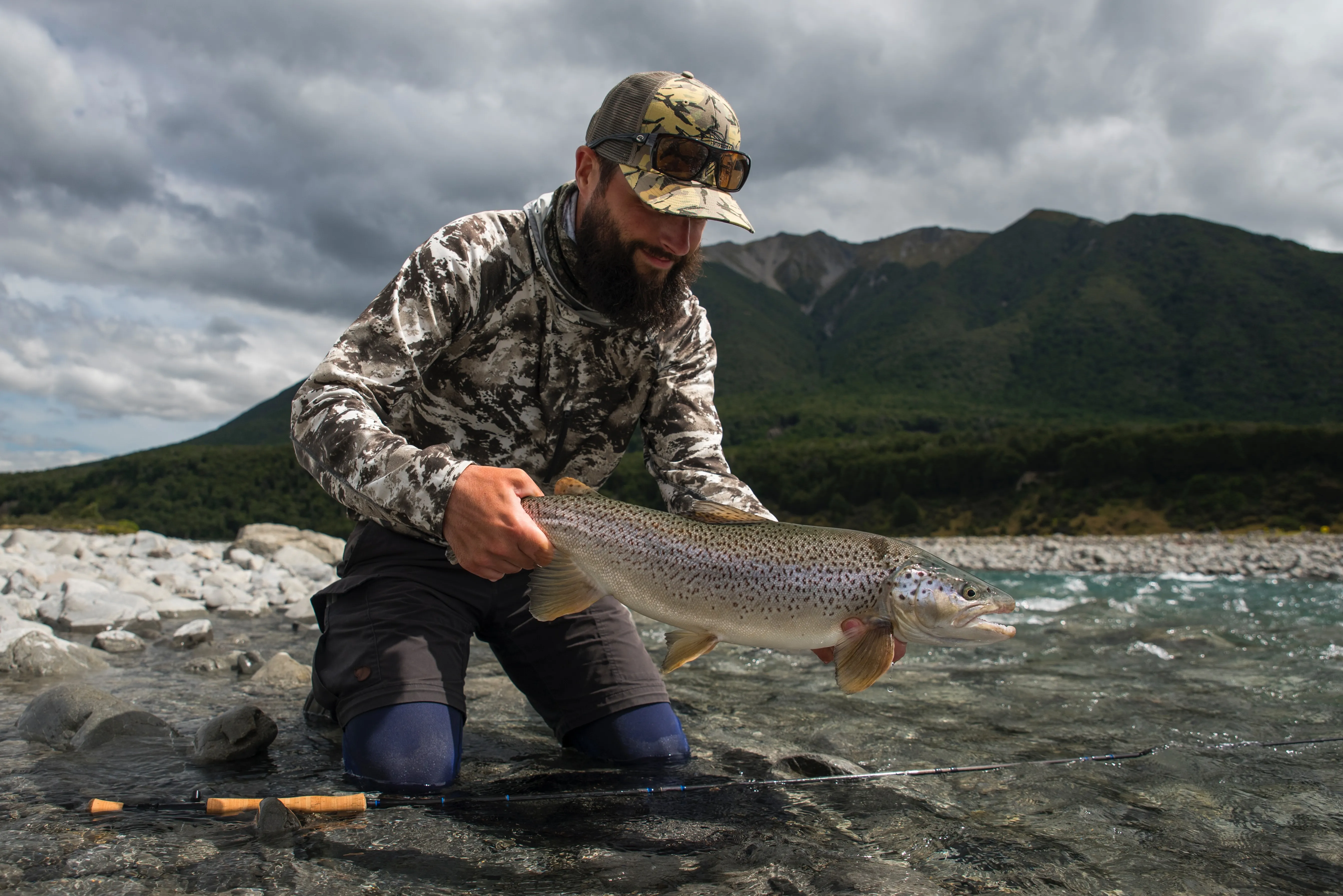 Dry fly action during low light conditions. Even when fish are not actively rising they still will sometimes grab a well-presented dry fly. This brown trout took the Elk Hair Caddis on a dry dropper rig.